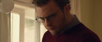 Movie still from “I Origins” (2014), directed by Mike Cahill – A person wearing glasses; Close Up shot, Low angle