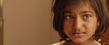 Movie still from “I Origins” (2014), directed by Mike Cahill – A young girl's face; Close Up shot, High angle