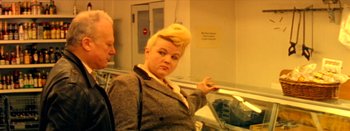 Movie still from “I Stand Alone” (1998), directed by Gaspar Noé – A man and a woman in a room; Close Up shot, Low angle