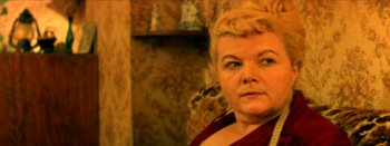 Movie still from “I Stand Alone” (1998), directed by Gaspar Noé – A person with blonde hair; Close Up shot, High angle