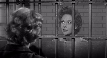 Movie still from “I Want to Live!” (1958), directed by Robert Wise – A black and white photo of a woman in a jail cell; Close Up shot, Over the shoulder angle