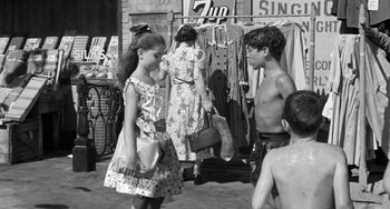 Movie still from “I'll Cry Tomorrow” (1955), directed by Daniel Mann – A black and white photo of a boy and a little girl; Medium shot, Over the shoulder angle