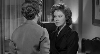 Movie still from “I'll Cry Tomorrow” (1955), directed by Daniel Mann – Two women are looking at each other in a room; Close Up shot, Over the shoulder angle