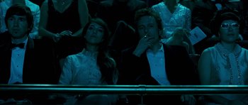 Movie still from “I'm Not There” (2007), directed by Todd Haynes – A man and a woman sitting next to each other; Medium shot, High angle