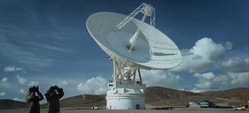 Movie still from “Ice Station Zebra” (1968), directed by John Sturges – A large satellite dish sitting on top of a hill; Extreme Wide shot, High angle