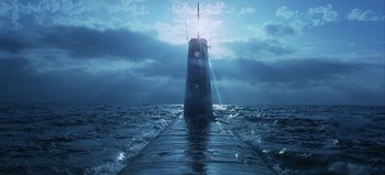 Movie still from “Ice Station Zebra” (1968), directed by John Sturges – A boat in the water with a light shining on it; Extreme Wide shot, Low angle