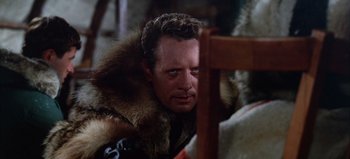 Movie still from “Ice Station Zebra” (1968), directed by John Sturges – A person wearing a fur coat; Close Up shot, Over the shoulder angle