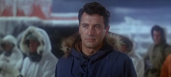 Movie still from “Ice Station Zebra” (1968), directed by John Sturges – A person wearing a jacket; Close Up shot, Over the shoulder angle