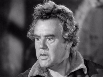 Movie still from “If I Were King” (1938), directed by Frank Lloyd – An old photo of a man with a beard; Close Up shot, Low angle