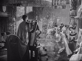 Movie still from “If I Were King” (1938), directed by Frank Lloyd – An old photo of a person painting a picture; Wide shot, High angle