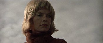 Movie still from “Images” (1972), directed by Robert Altman – A person wearing a sweater; Close Up shot, Low angle