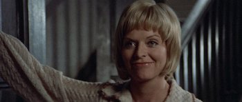 Movie still from “Images” (1972), directed by Robert Altman – A person with short blonde hair; Close Up shot, Low angle