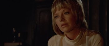 Movie still from “Images” (1972), directed by Robert Altman – A person with short blonde hair; Close Up shot, Low angle