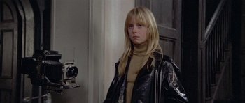 Movie still from “Images” (1972), directed by Robert Altman – A young girl wearing a black leather jacket; Close Up shot, Low angle