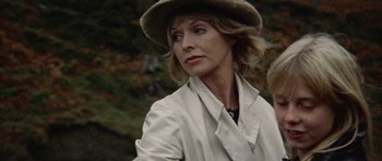 Movie still from “Images” (1972), directed by Robert Altman – A person wearing a hat and a jacket; Close Up shot, Low angle