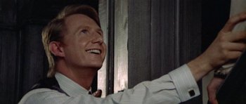 Movie still from “Images” (1972), directed by Robert Altman – A person smiling; Close Up shot, Low angle