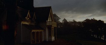 Movie still from “Images” (1972), directed by Robert Altman – A house that is in the middle of the night; Extreme Wide shot, Low angle