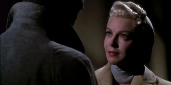 Movie still from “Imitation of Life” (1959), directed by Douglas Sirk – A man and a woman are looking at one another; Close Up shot, Over the shoulder angle