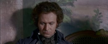 Movie still from “Immortal Beloved” (1994), directed by Bernard Rose – A person wearing a jacket; Close Up shot, High angle