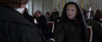 Movie still from “Immortal Beloved” (1994), directed by Bernard Rose – A woman wearing a black robe and a black veil; Close Up shot, Over the shoulder angle