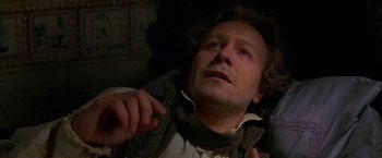 Movie still from “Immortal Beloved” (1994), directed by Bernard Rose – A person wearing a vest; Close Up shot, Overhead angle