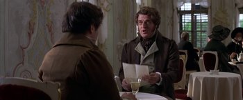 Movie still from “Immortal Beloved” (1994), directed by Bernard Rose – A man in a brown jacket is talking to a man in a brown jacket; Medium shot, Over the shoulder angle