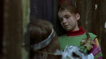 Movie still from “In America” (2002), directed by Jim Sheridan – A young girl looking at another young girl; Close Up shot, Over the shoulder angle