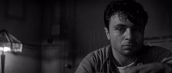 Movie still from “In Cold Blood” (1967), directed by Richard Brooks – Black and white photograph of a man with a tear in his eye; Close Up shot, Low angle