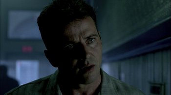 Movie still from “In Dreams” (1999), directed by Neil Jordan – A person looking at the camera; Close Up shot, Low angle