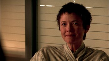 Movie still from “In Dreams” (1999), directed by Neil Jordan – A person with short black hair; Close Up shot, Over the shoulder angle