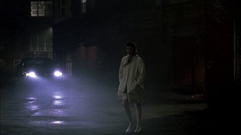 Movie still from “In Dreams” (1999), directed by Neil Jordan – A person standing in the middle of a street; Wide shot, Low angle