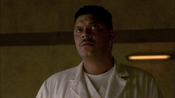 Movie still from “In Dreams” (1999), directed by Neil Jordan – A person wearing a lab coat; Close Up shot, Low angle