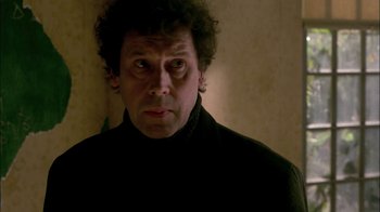 Movie still from “In Dreams” (1999), directed by Neil Jordan – A person wearing a black shirt; Close Up shot, Low angle