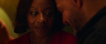 Movie still from “In Fabric” (2018), directed by Peter Strickland – A woman's face and a man's face; Close Up shot, Over the shoulder angle