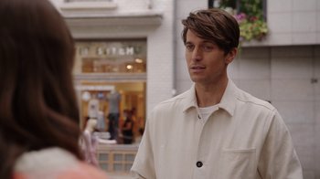 Movie still from “Emily in Paris” (2020), created by Darren Star – Close Up shot, Over the shoulder angle