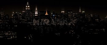 Movie still from “In the Bedroom” (2001), directed by Todd Field – A view of a city at night from a distance; Extreme Wide shot, High angle