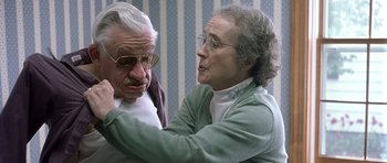 Movie still from “In the Bedroom” (2001), directed by Todd Field – An older man and a younger man are looking at each other; Close Up shot, Over the shoulder angle