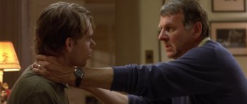 Movie still from “In the Bedroom” (2001), directed by Todd Field – An older man and a young man are looking at each other; Close Up shot, Over the shoulder angle