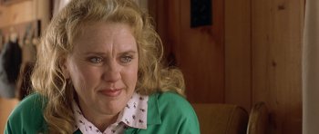 Movie still from “In the Bedroom” (2001), directed by Todd Field – A person wearing a green shirt; Close Up shot, Over the shoulder angle