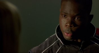 Movie still from “In the Cut” (2003), directed by Jane Campion – A person wearing a jacket; Close Up shot, High angle