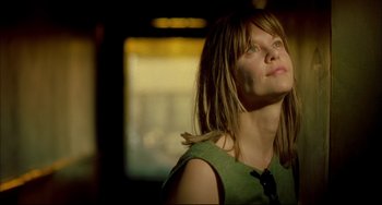 Movie still from “In the Cut” (2003), directed by Jane Campion – A woman with long hair is looking upward; Close Up shot, Low angle