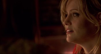 Movie still from “In the Cut” (2003), directed by Jane Campion – A woman's face in the dark; Close Up shot, Over the shoulder angle