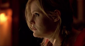 Movie still from “In the Cut” (2003), directed by Jane Campion – A person's face in the dark; Extreme Close Up shot, Low angle