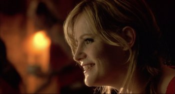 Movie still from “In the Cut” (2003), directed by Jane Campion – A woman's face in a dimly - lit room; Close Up shot, Over the shoulder angle