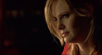 Movie still from “In the Cut” (2003), directed by Jane Campion – A person wearing a red shirt; Close Up shot, Low angle