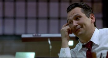 Movie still from “In the Cut” (2003), directed by Jane Campion – A person wearing a white shirt; Close Up shot, Low angle