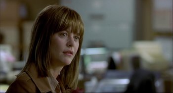 Movie still from “In the Cut” (2003), directed by Jane Campion – A person wearing a jacket; Close Up shot, Over the shoulder angle