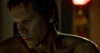 Movie still from “In the Cut” (2003), directed by Jane Campion – A person with wet hair; Close Up shot, Over the shoulder angle