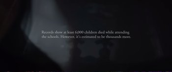 Movie still from “Indian Horse” (2017), directed by Stephen S. Campanelli – A black background with a quote about children; Extreme Close Up shot, High angle