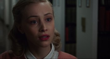 Movie still from “Indignation” (2016), directed by James Schamus – A young woman with blonde hair and blue eyes; Close Up shot, High angle